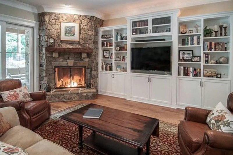 Living room with corner fireplace