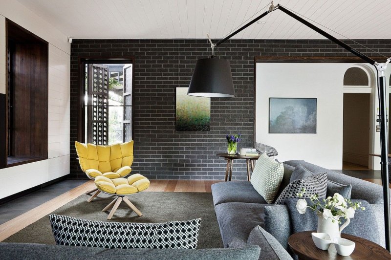 Black brick in the interior of the living room