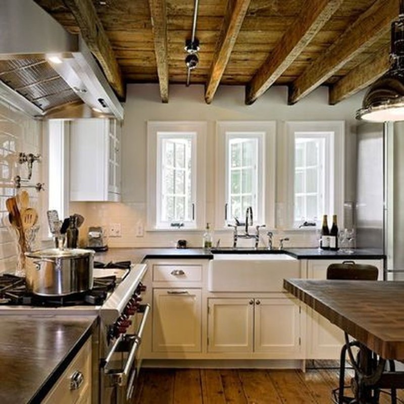 Kitchen with beams on the ceiling