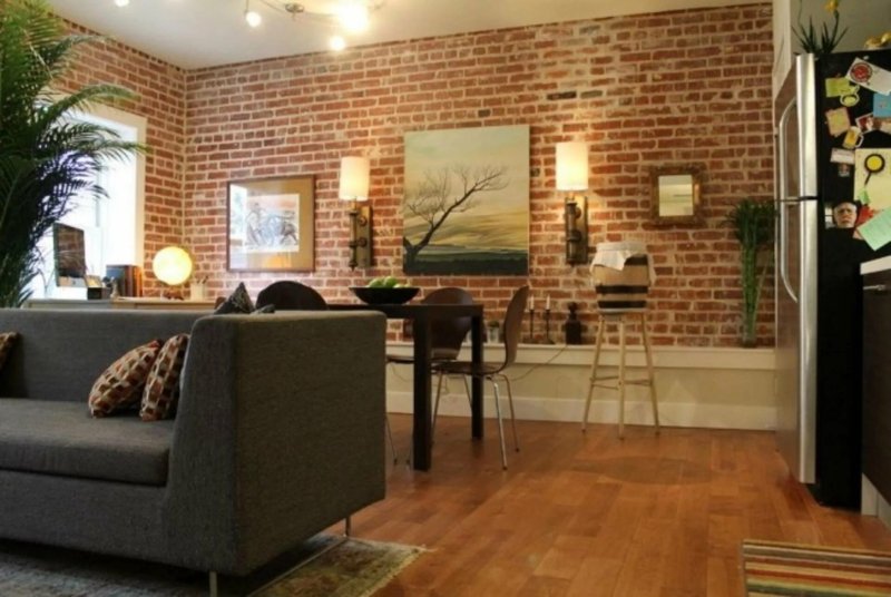 Living room with a brick wall