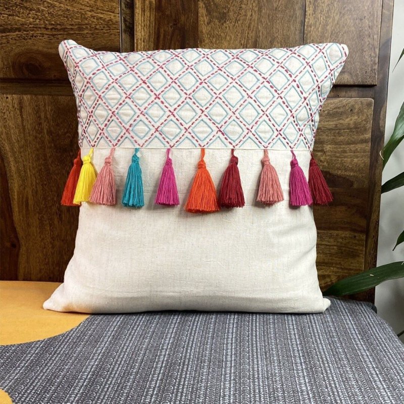 A pillow with tassels