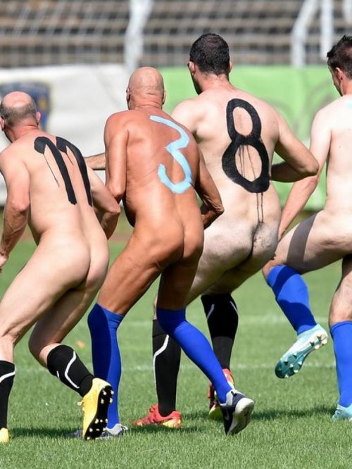 Naked man on a football field