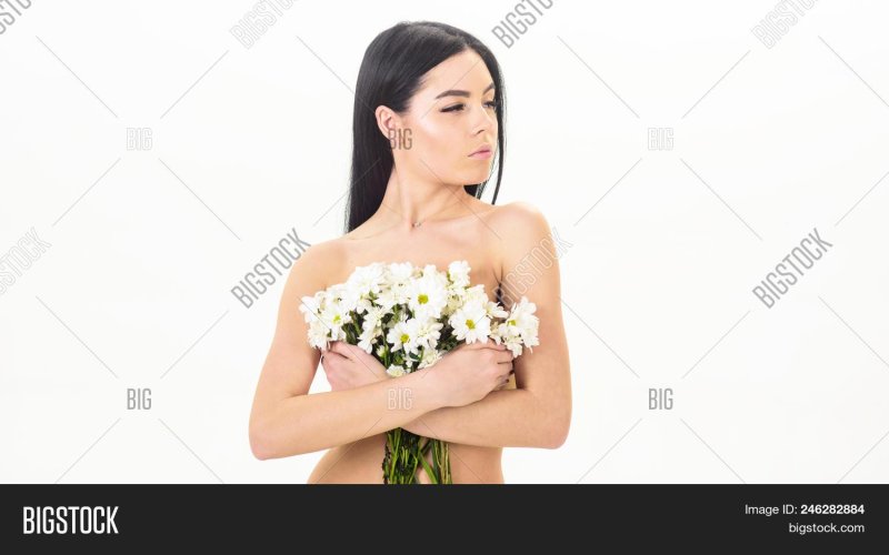 The girl is covered with flowers