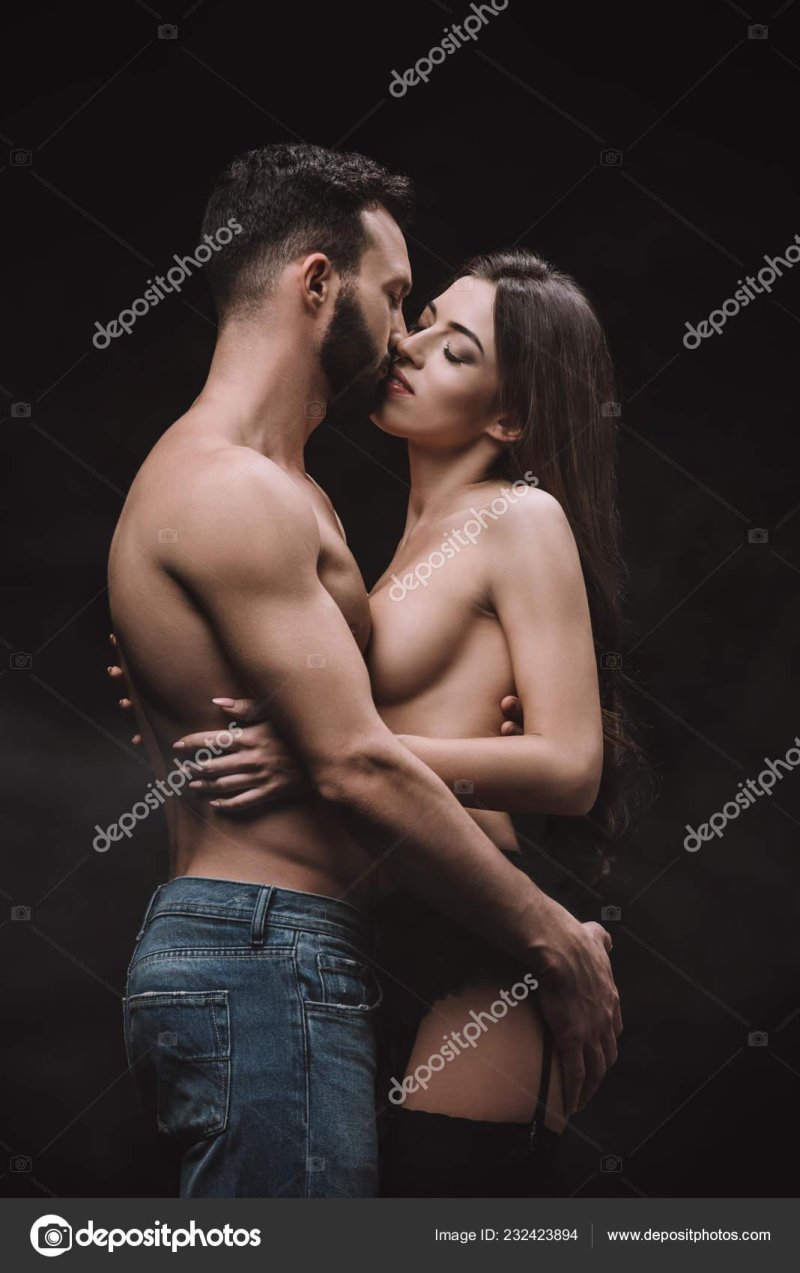 The guy hugs a naked girl