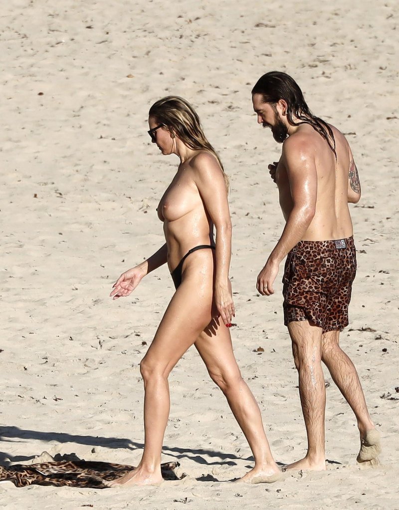 Heidi Klum and Tom Kaulitz on the beach