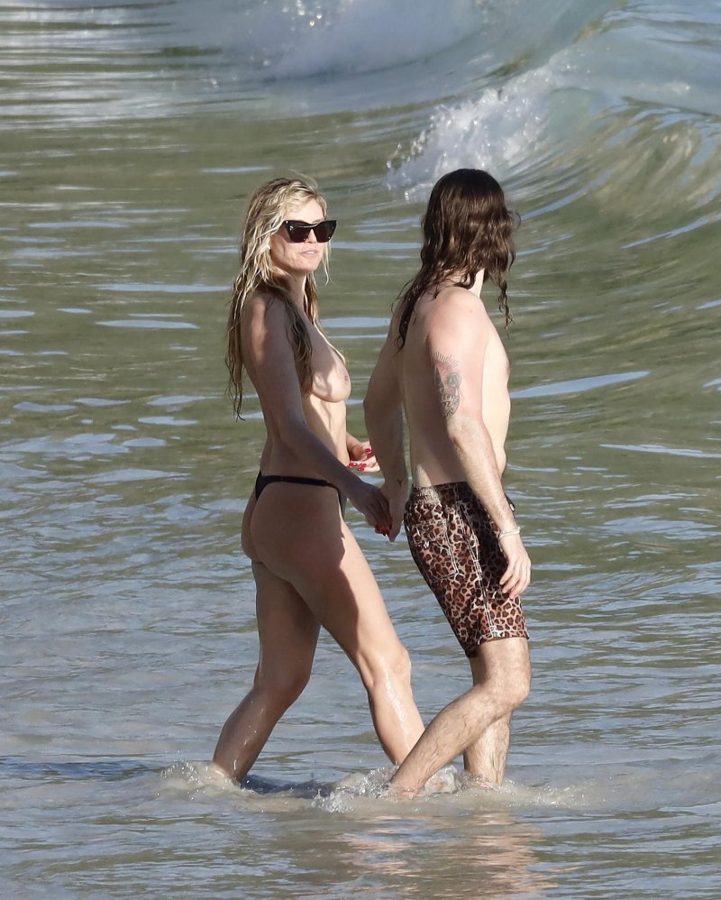 Heidi Klum and Tom Kaulitz on the beach