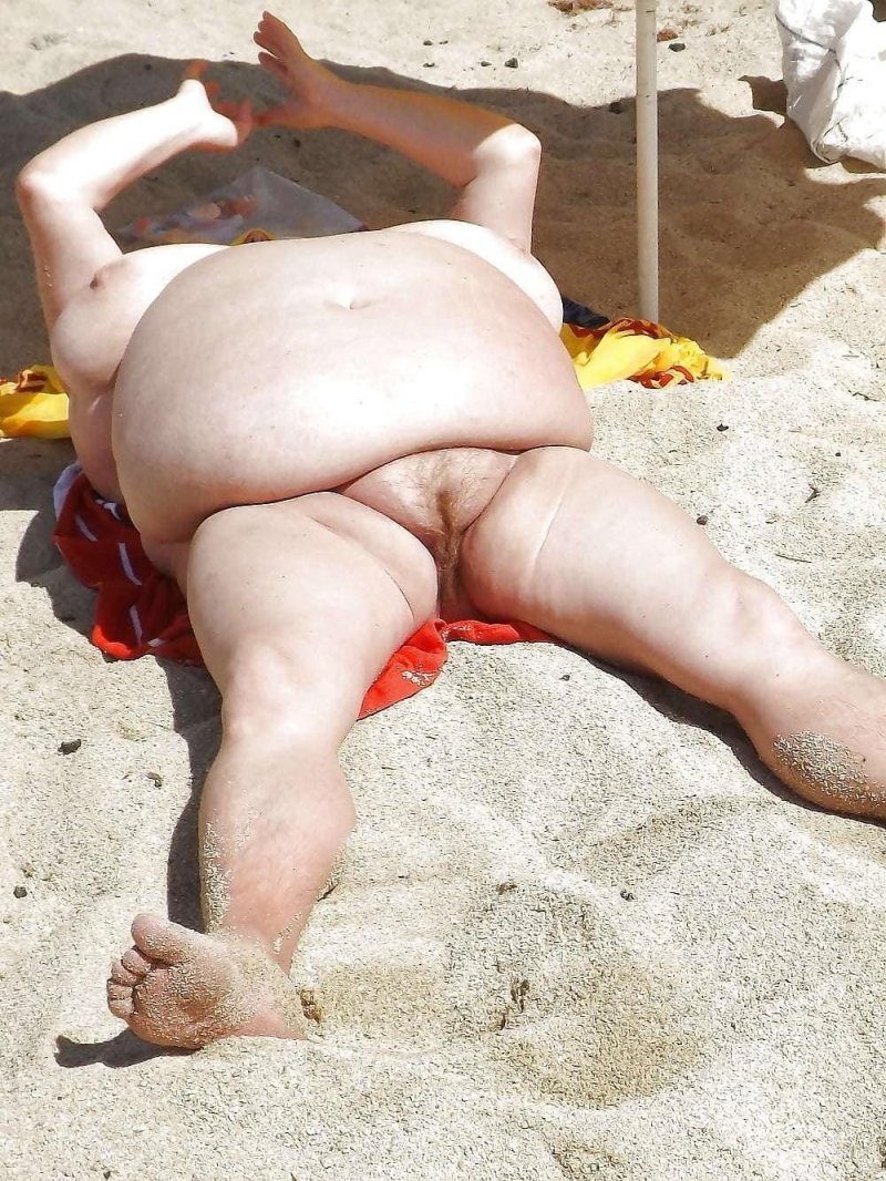 Old women without panties on the beach