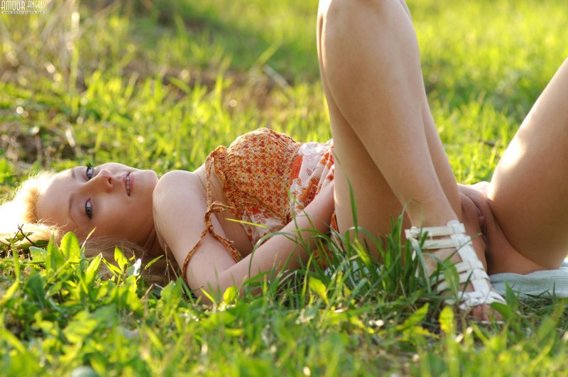 Girl on the grass without panties