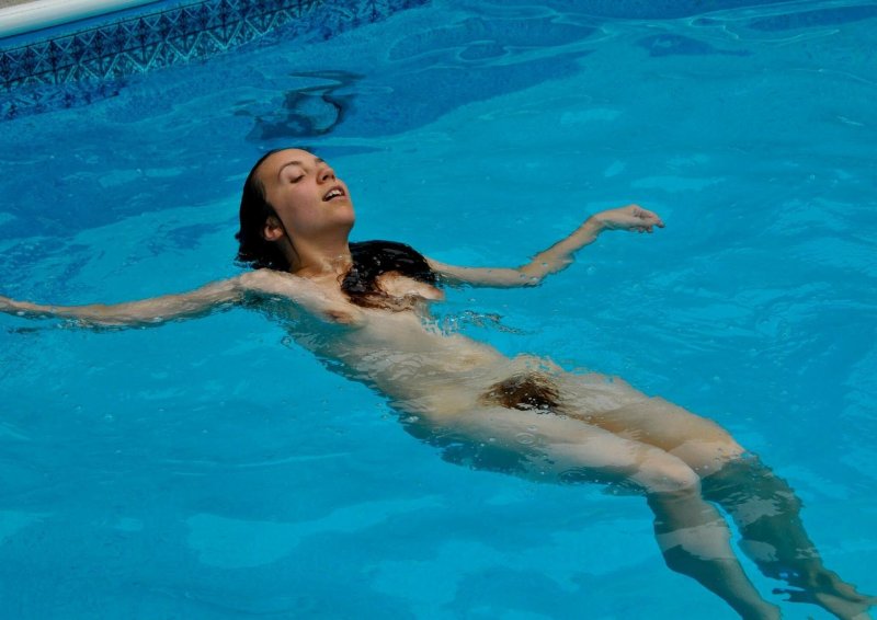 Swimming naked in the pool