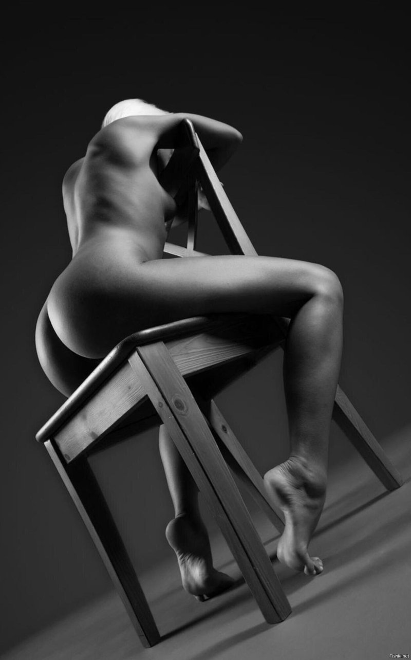 Erotic photo shoot on a chair