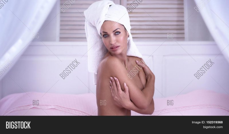 Girl with a towel on the head of nude