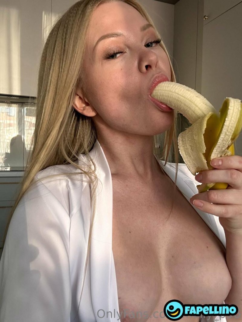 Banana in her mouth