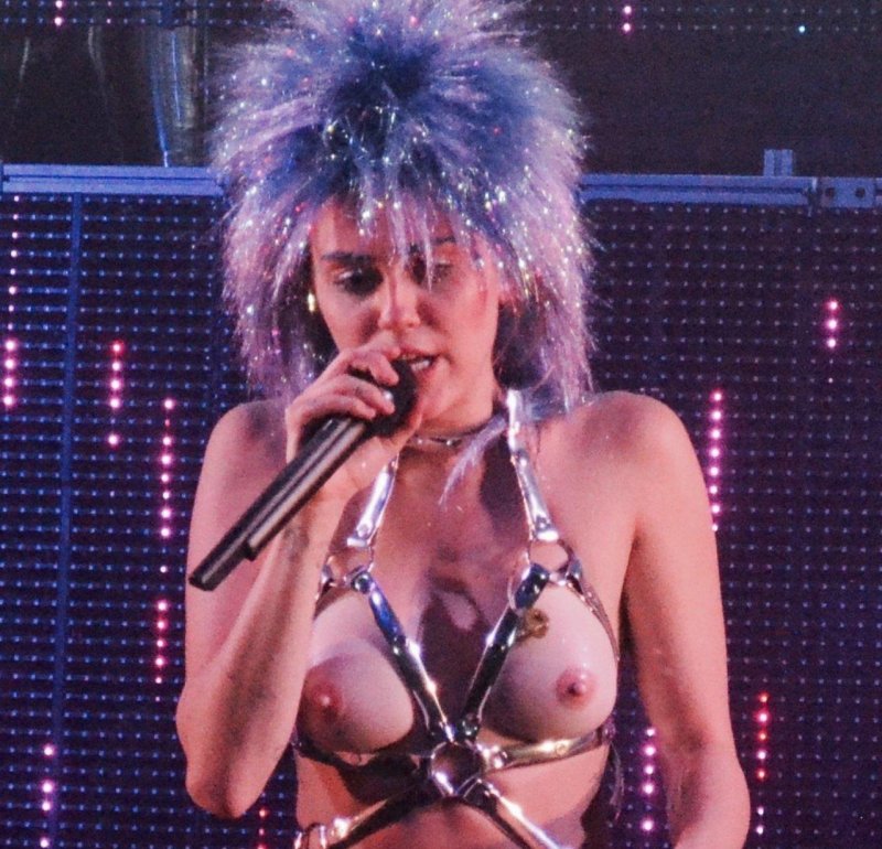 Miley Cyrus Naked at a concert