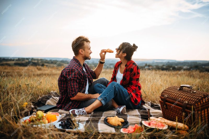A guy with girl on picnic