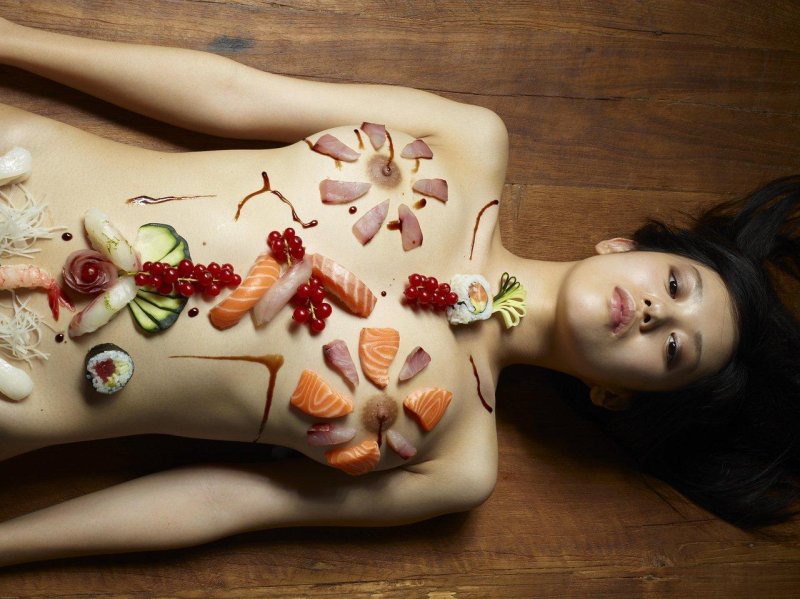 Sushi on a naked girl