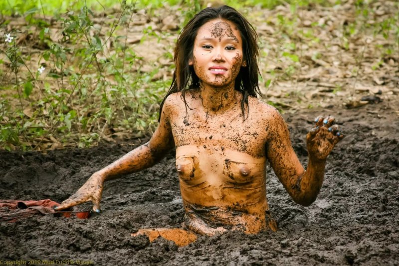 Woman in mud