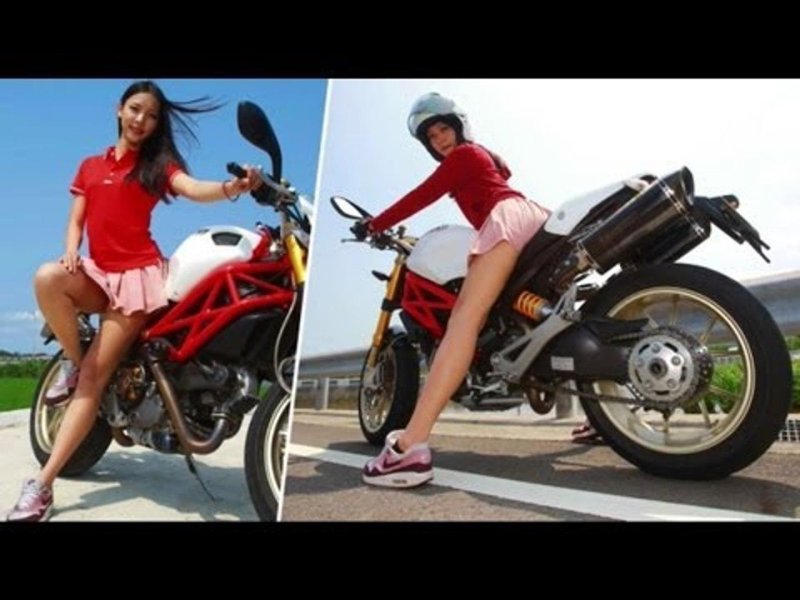 Girl on a motorcycle in skirt