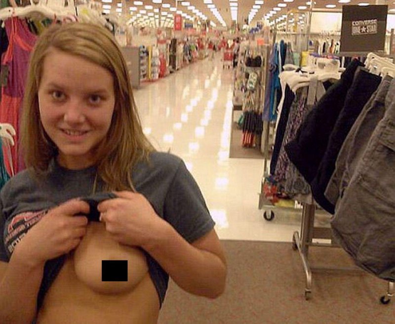 Naked boobs in the Public XXX store