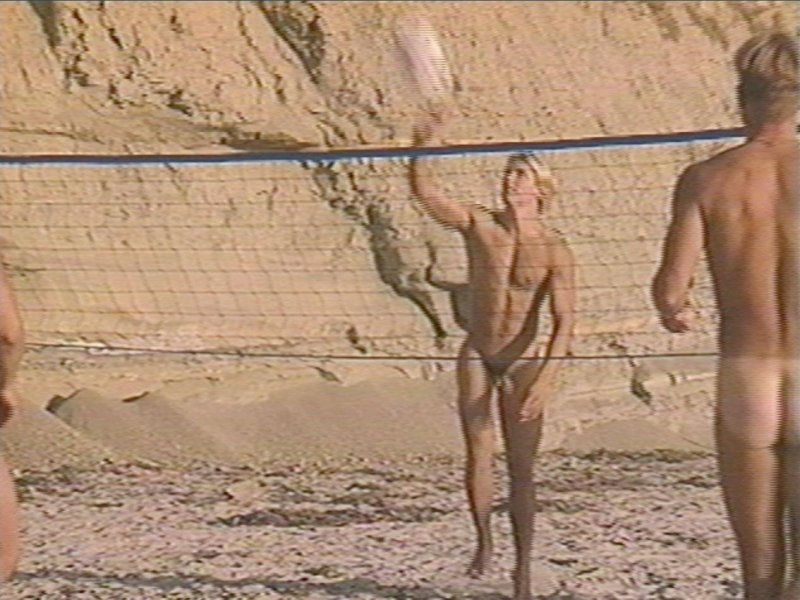 A man runs naked on the beach