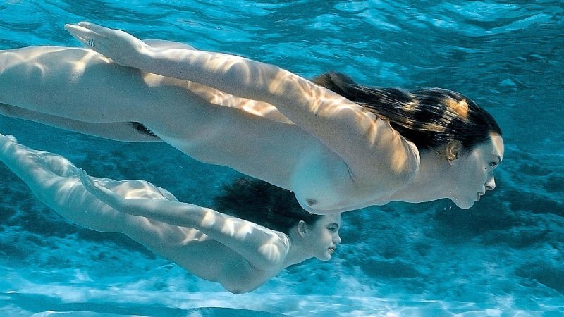 Naked woman in water