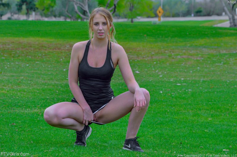 The athlete undresses in park