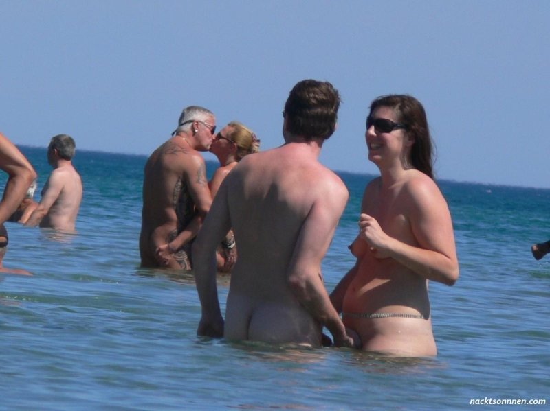 On the beach in thongs
