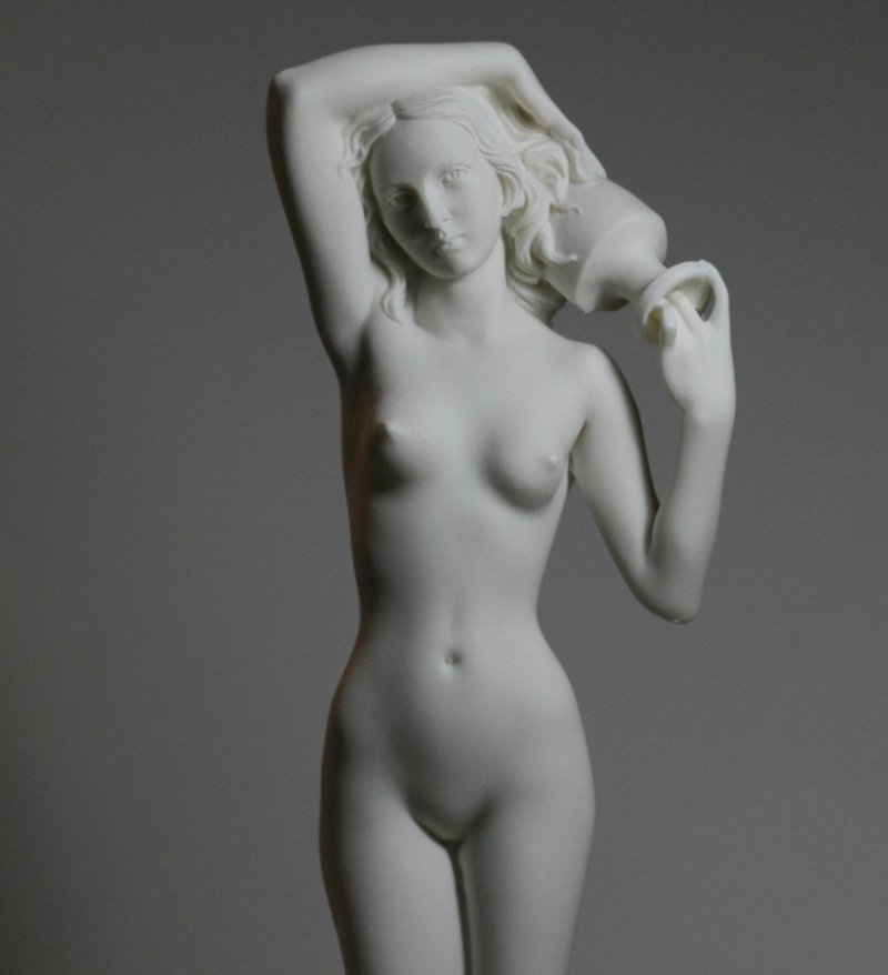 Figurine girl with a jug