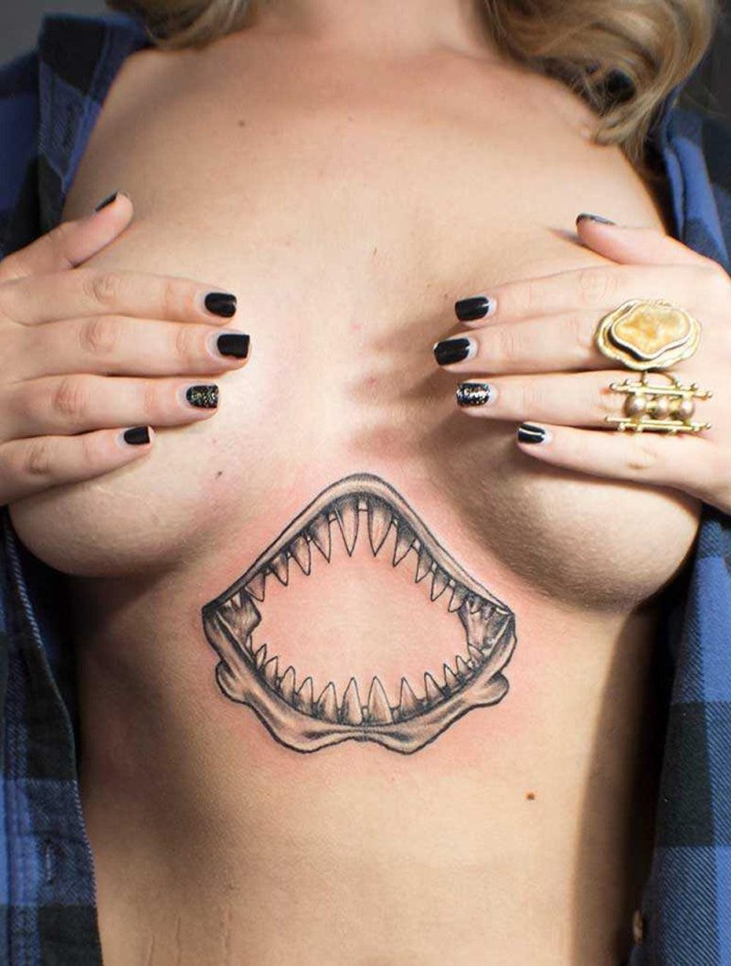 The jaw of shark on knee