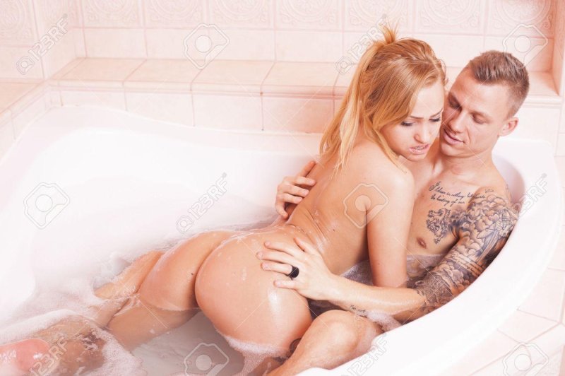 Boy and girl in Jacuzzi