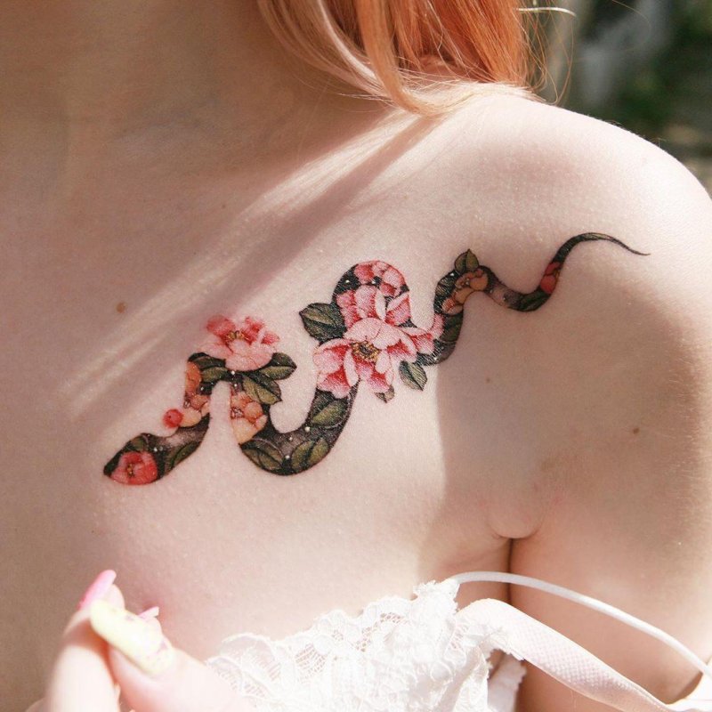 Tattoo with a snake for girls
