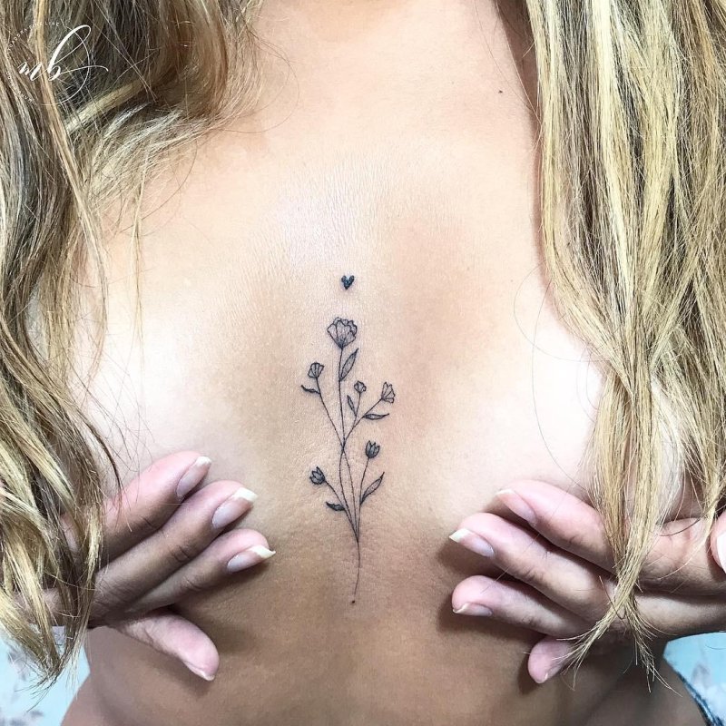 Tattoos between breasts for girls