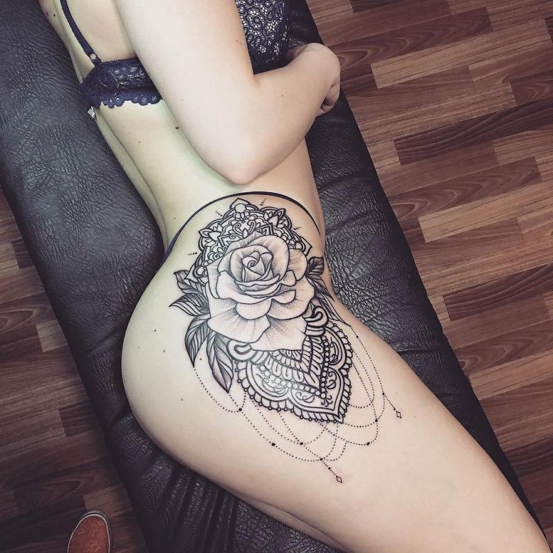 On the thigh tattoo
