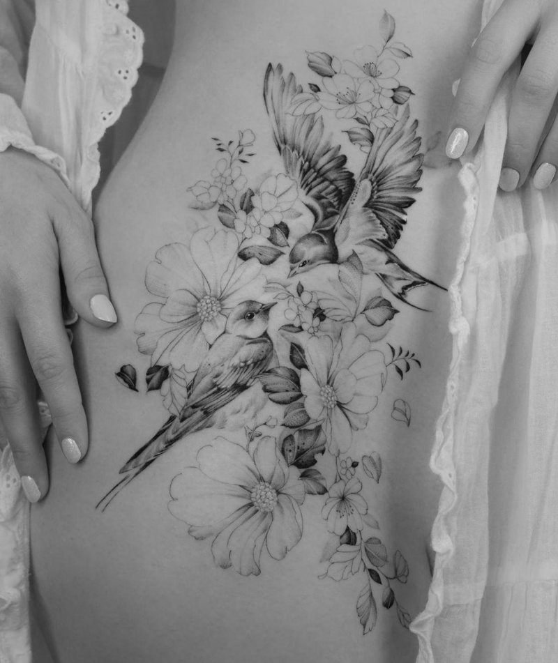 Female tattoo on the thigh