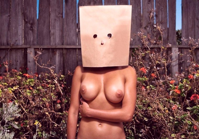 Girl with a bag on her head