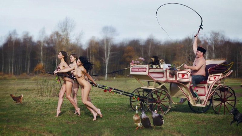 Naked women harnessed to the carts
