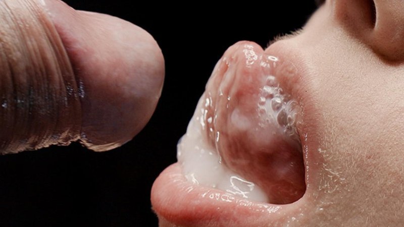 Cumshot in the mouth close -up