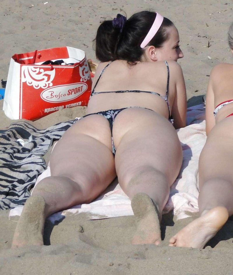 On the beach in thongs