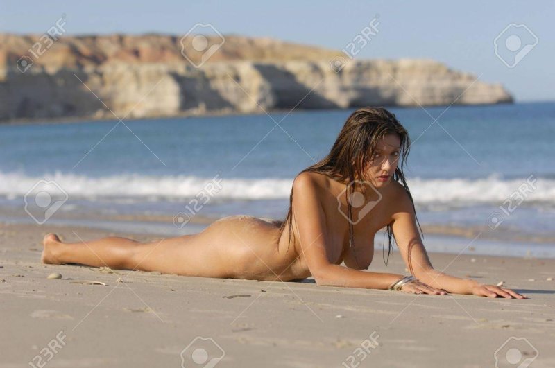 On the beach topless