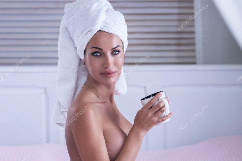 Naked with a towel on her head