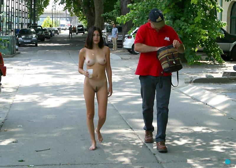 The girl undresses on street