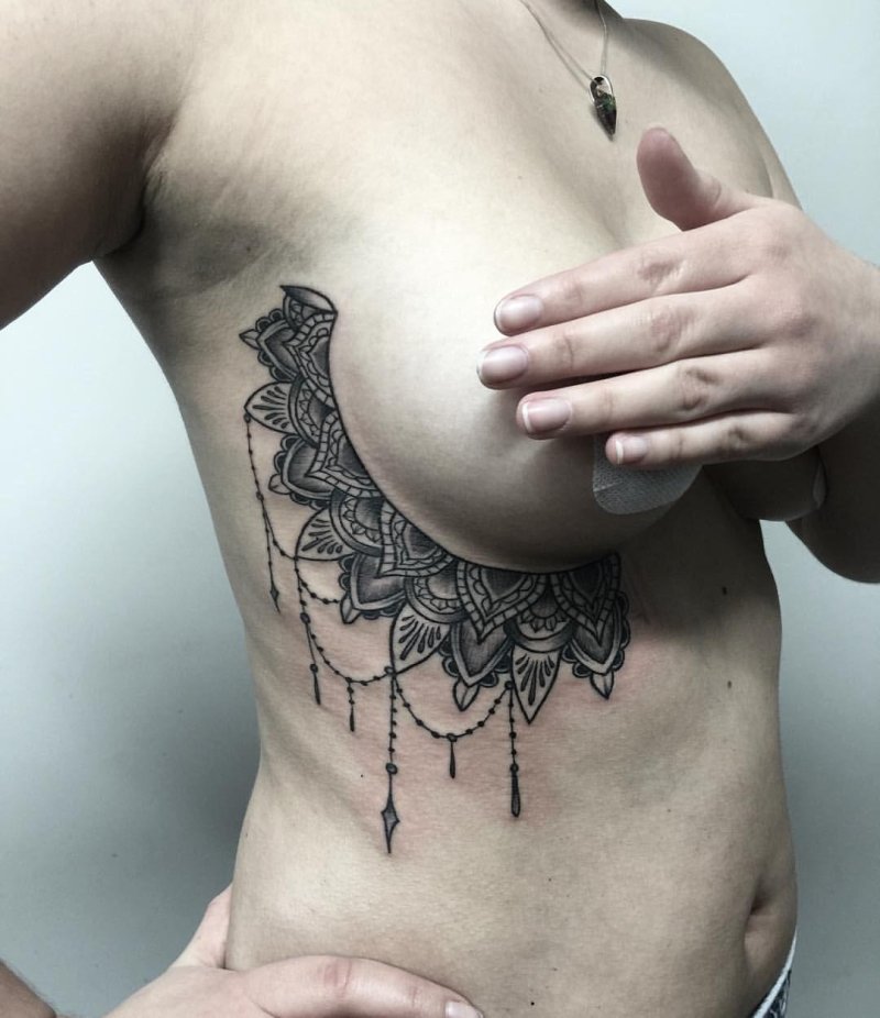 Female tattoos under the chest