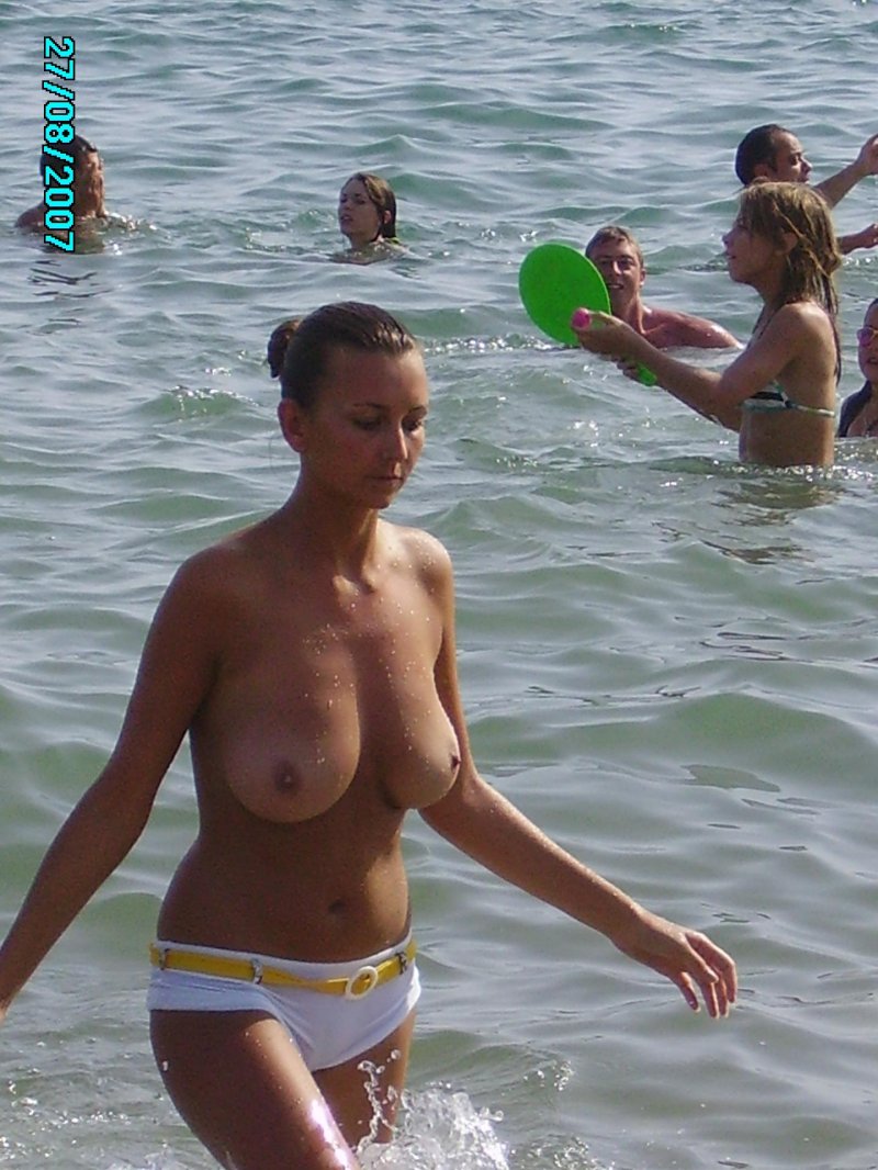 On the beach topless