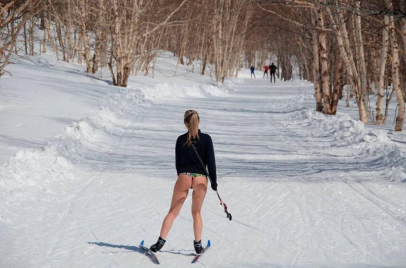 The girl skis is skiing